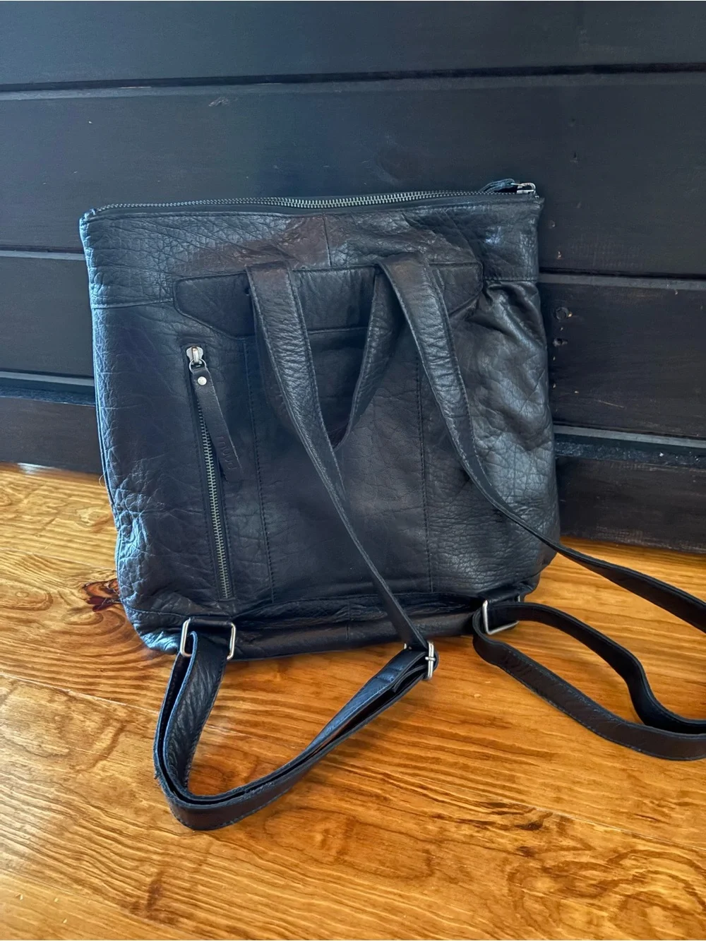 Muud Black Leather Backpack Purse Adjustable Straps Multiple Pockets Zip Close